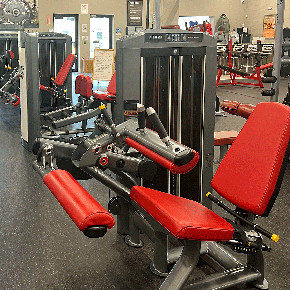 A gym with exercise equipment.