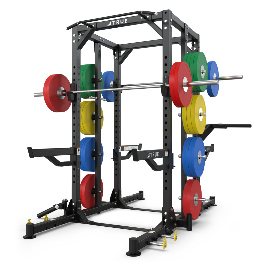 A black power rack with a barbell, assorted colored weight plates, safety arms, and attachments, designed for weightlifting and strength training, is shown on a white background.