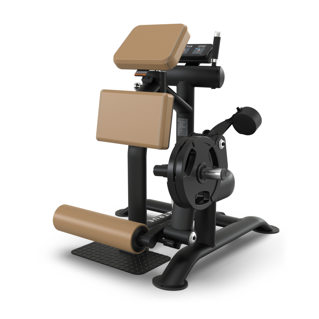 A black and tan seated leg curl gym machine with padded supports, a foot roller, weight plate holder, and a textured foot platform, designed for lower body exercises.