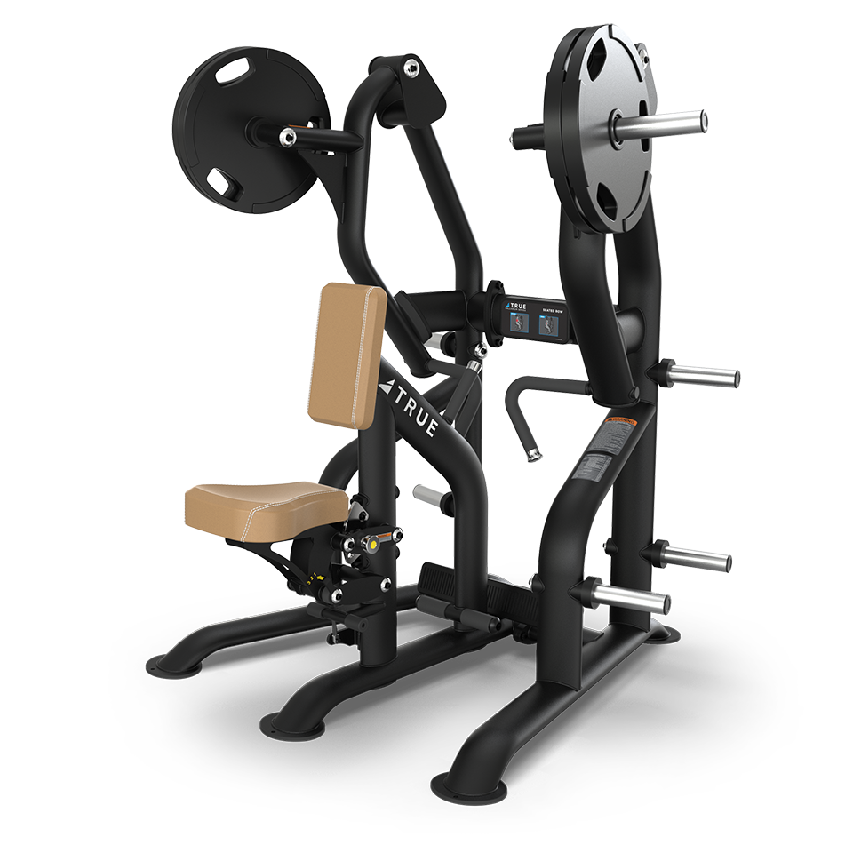 A black, seated weight machine with a tan padded seat and backrest, loaded with round black weight plates. The machine has multiple handles, footrests, and storage pegs for extra weight plates.