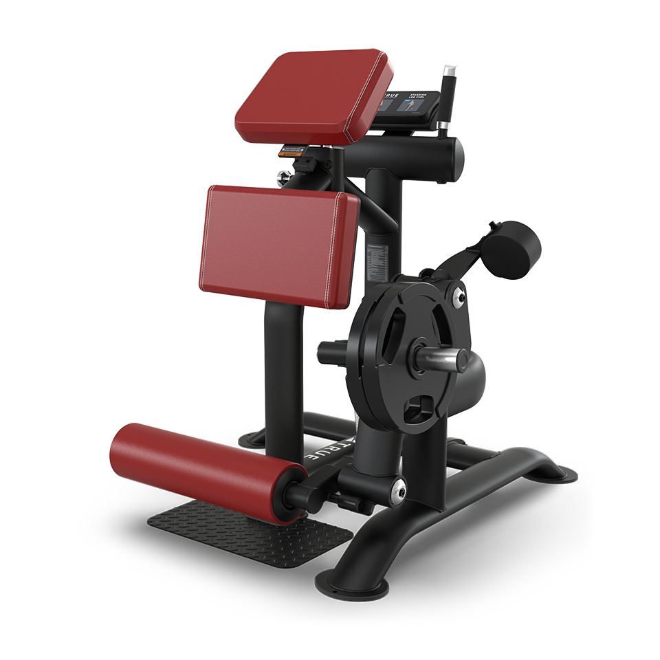 A black and red gym machine designed for leg curls or extensions, with padded seats and rollers, a foot platform, and weight plates loaded on the side, all set against a plain white background.