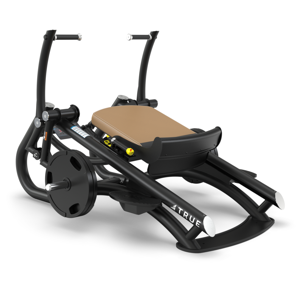 A black and silver fitness machine with a brown padded seat, large footrests, and handles, designed for leg press exercises. The frame is labeled TRUE and features adjustable weight plates and controls.