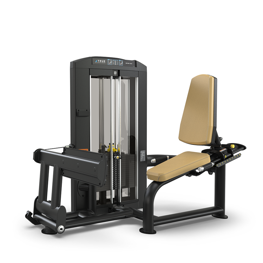 A commercial leg extension machine with a padded tan seat and backrest, a black metal frame, and weight stack enclosure, designed for gym use to target the leg muscles.