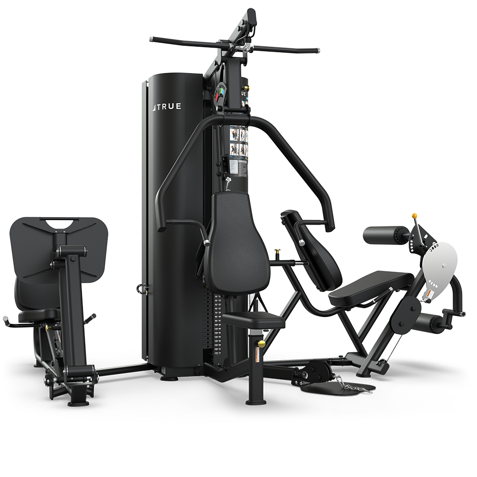 A multi-station gym machine with various workout stations, including a chest press, leg extension, leg press, and lat pulldown, all in black with padded seats and instructional diagrams attached.