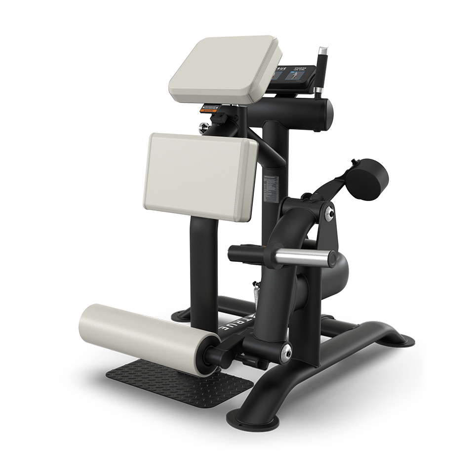 Black and white gym machine with padded supports and rollers, designed for seated leg exercises, on a sturdy base with textured footplate.