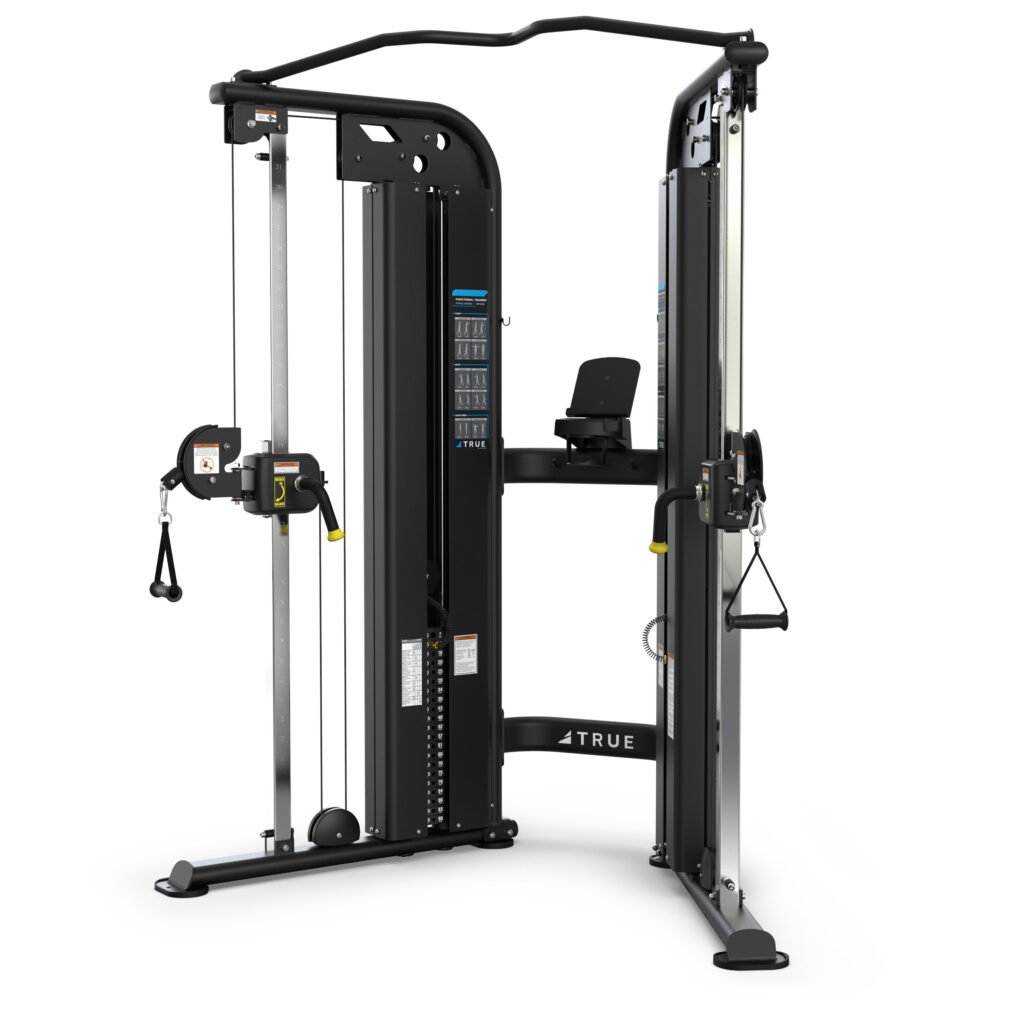 A black dual-stack functional trainer machine with adjustable pulleys, handles, cables, and a pull-up bar, used for strength training exercises in a gym setting.