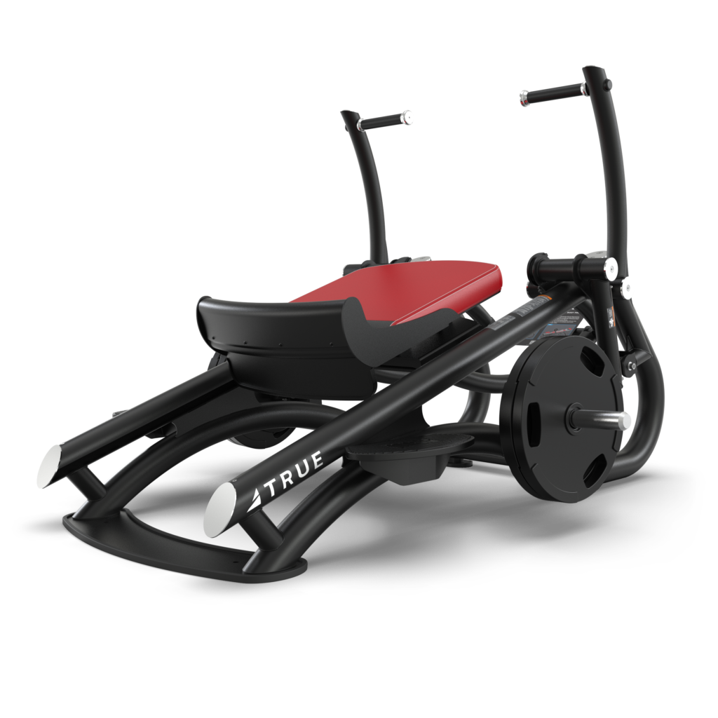A black and red leg press machine with weighted plates and a seat, designed for strength training, displayed on a white background. The brand name TRUE is visible on the frame.