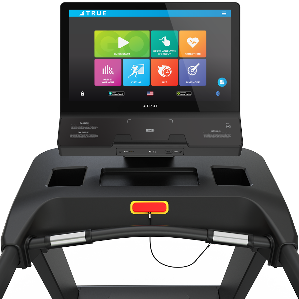 Close-up of a treadmill console with a large touchscreen display showing colorful workout options, including Quick Start, Draw Your Own, Select Mix, Preset, Virtual, HIIT, and Bike Mode. A red safety key is visible below the screen.
